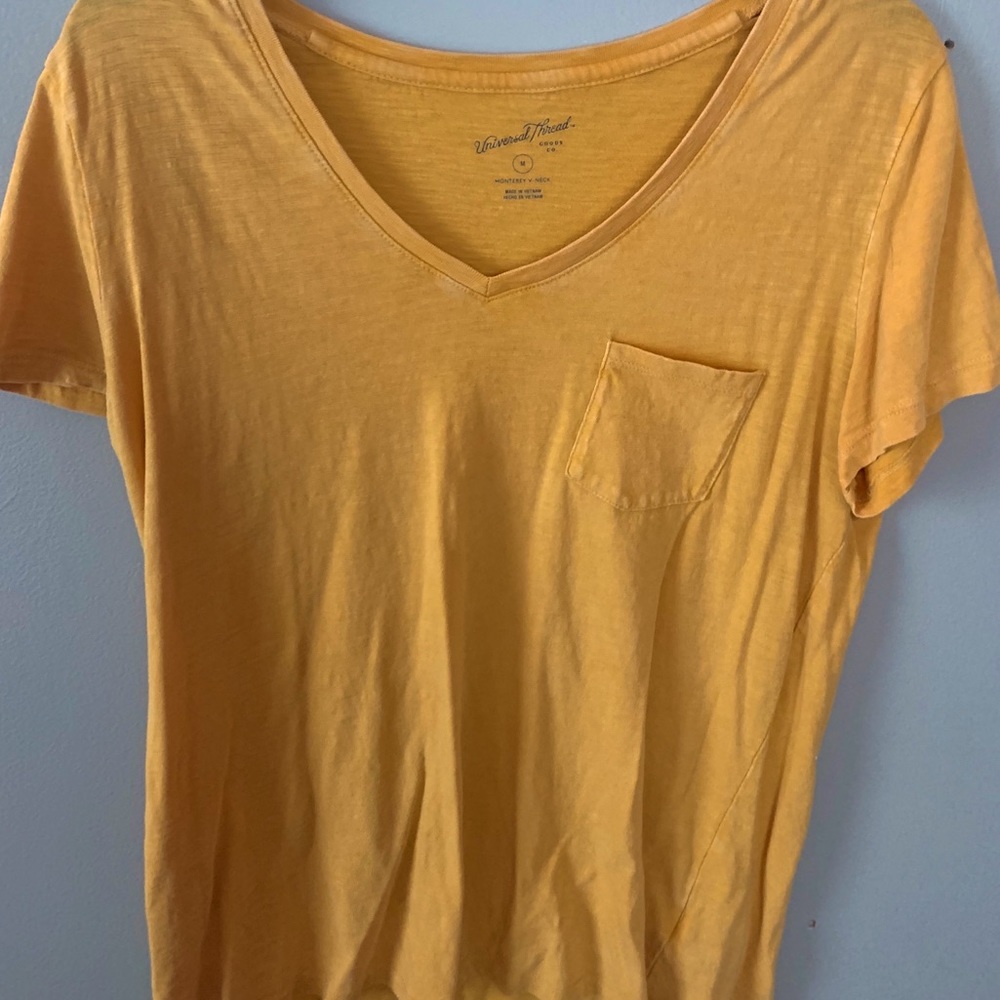 yellow/gold v-neck shirt